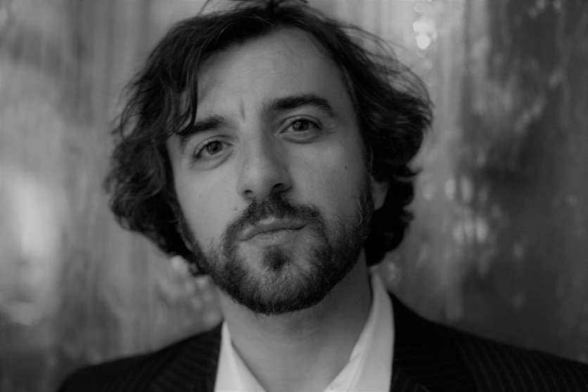 Writer/musician/educator Alan Semerdjian is the author of In the Architecture of Bone (GenPop Books). Semerdjian’s poems and essays have appeared in several print and online publications and anthologies, including The Brooklyn Rail, Adbusters, Frontier Poetry, and Diagram. He released a chapbook of poems called An Improvised Device (Lock n Load Press) in 2005, and his most recent work is a collaboration of poems and sound with guitarist/composer Aram Bajakian called The Serpent and The Crane, which can be found online at amerge.bandcamp.com. Semerdjian has performed and read all over North America, and his songs have appeared in television and film and charted on CMJ. He is also an award-winning educator and currently teaches at Herricks High School in New Hyde Park, N.Y.