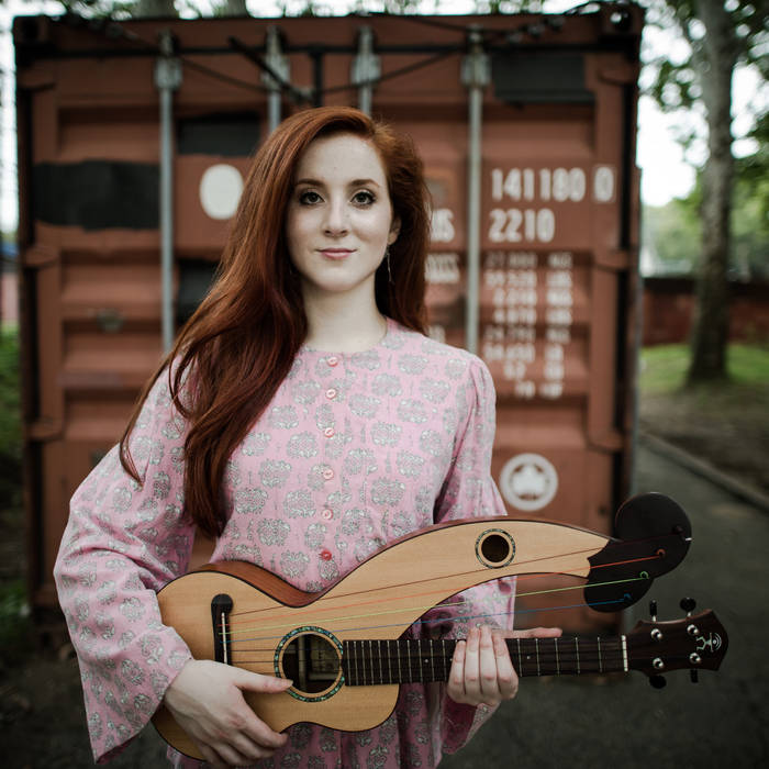 A “hybrid” variation of the ukulele—a quirky Hawaiian adaptation from the Portuguese machete—the harp ukulele features two different styles, which both look like a guitar with an extra arm. (Photo courtesy of Gracie Terzian).