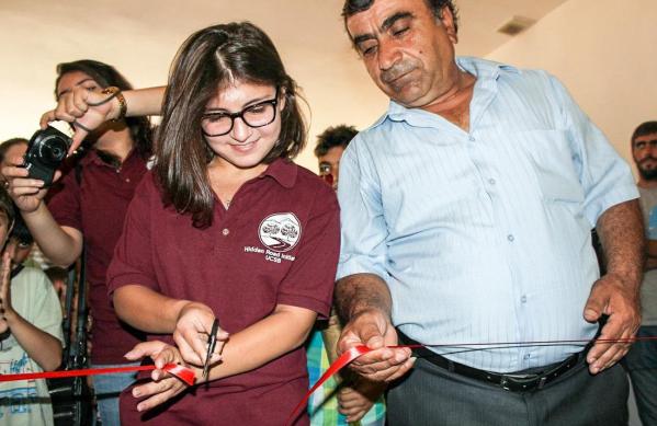 Hasmik cuts the ribbon at the Tsaghkaber kindergarten opening in the summer of 2016.