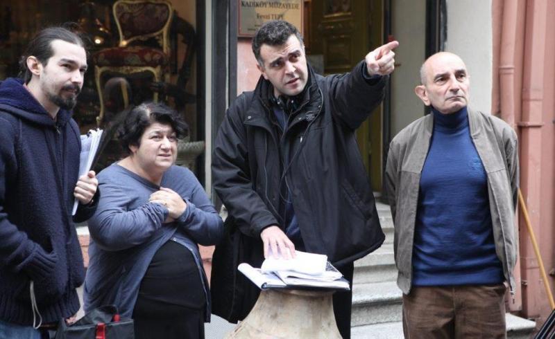 On the set of his 2011 short film, “Bolis,” with writer Serra Yilmaz (second from left) and actor Jacky Nercessian (right). Bolis was the first Turkish film to explicitly state the word “genocide” in reference to the Armenian Genocide. (Photo credit: Armenian Weekly)