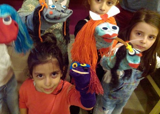 Hand-made puppets by children